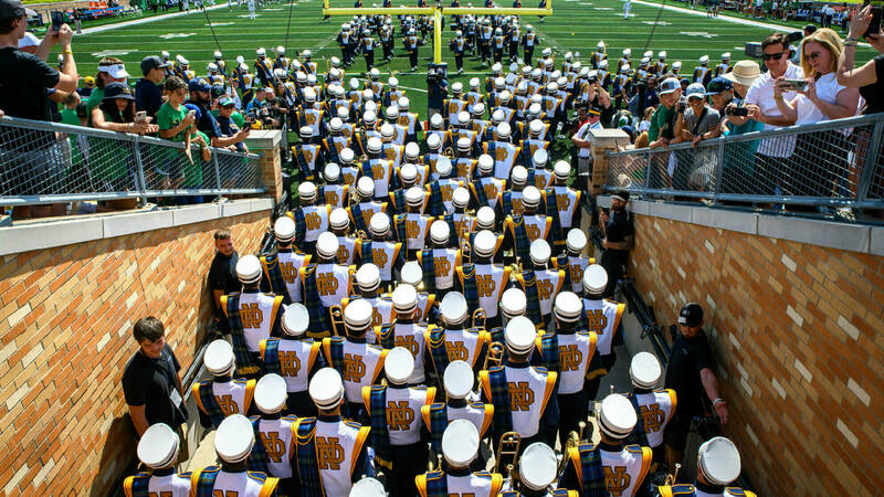 The Band of the Fighting Irish walking on the field for a home football game