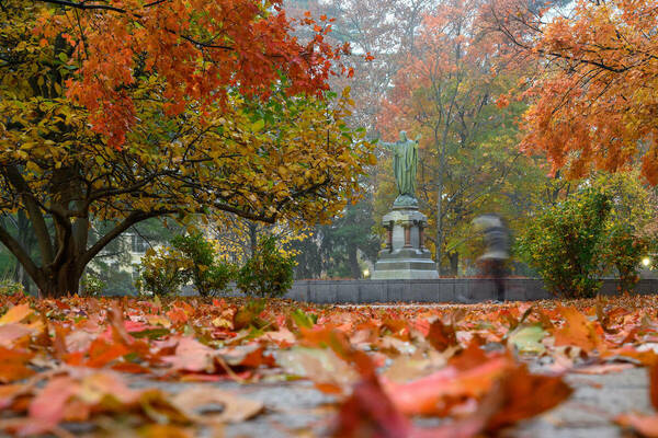 Sacred Heart Jesus statue on a foggy fall morning.